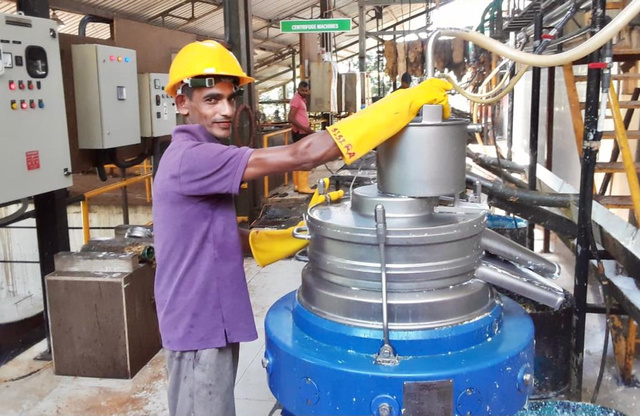Man working in the centrifuge factory